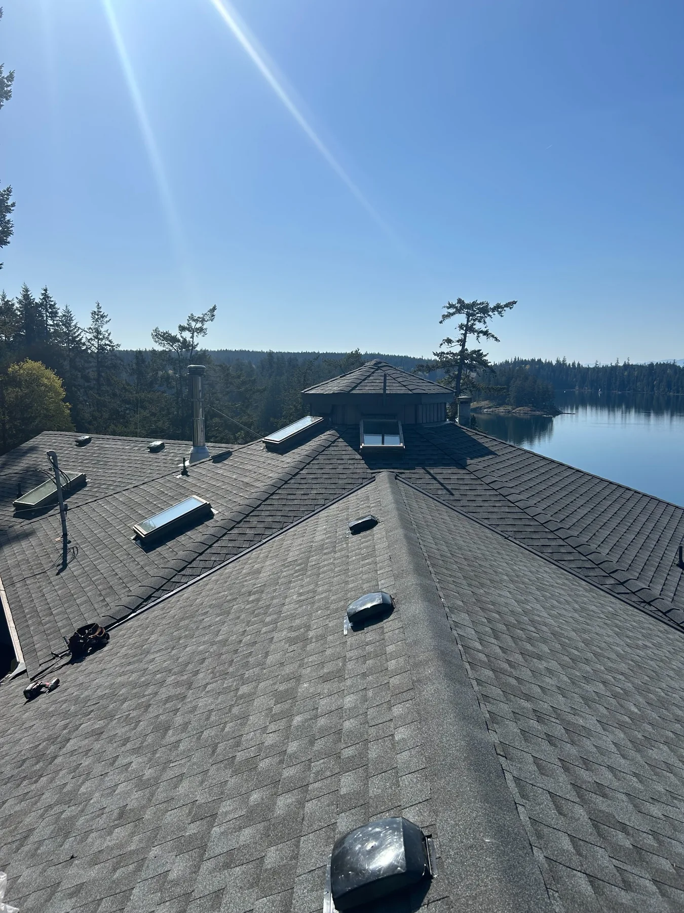 Completed architectural shingle roof on a Vancouver Island waterfront home